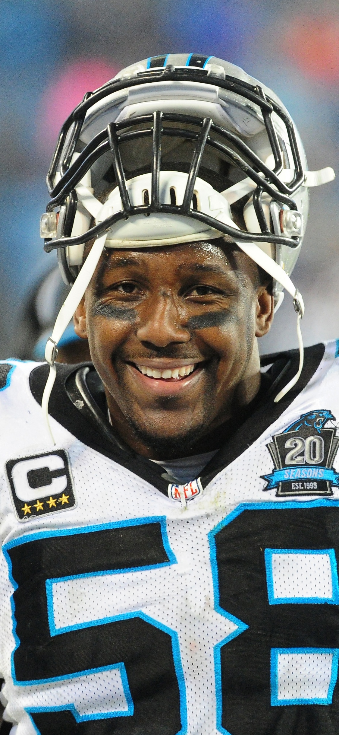 Man in Blue and White Football Jersey. Wallpaper in 1125x2436 Resolution