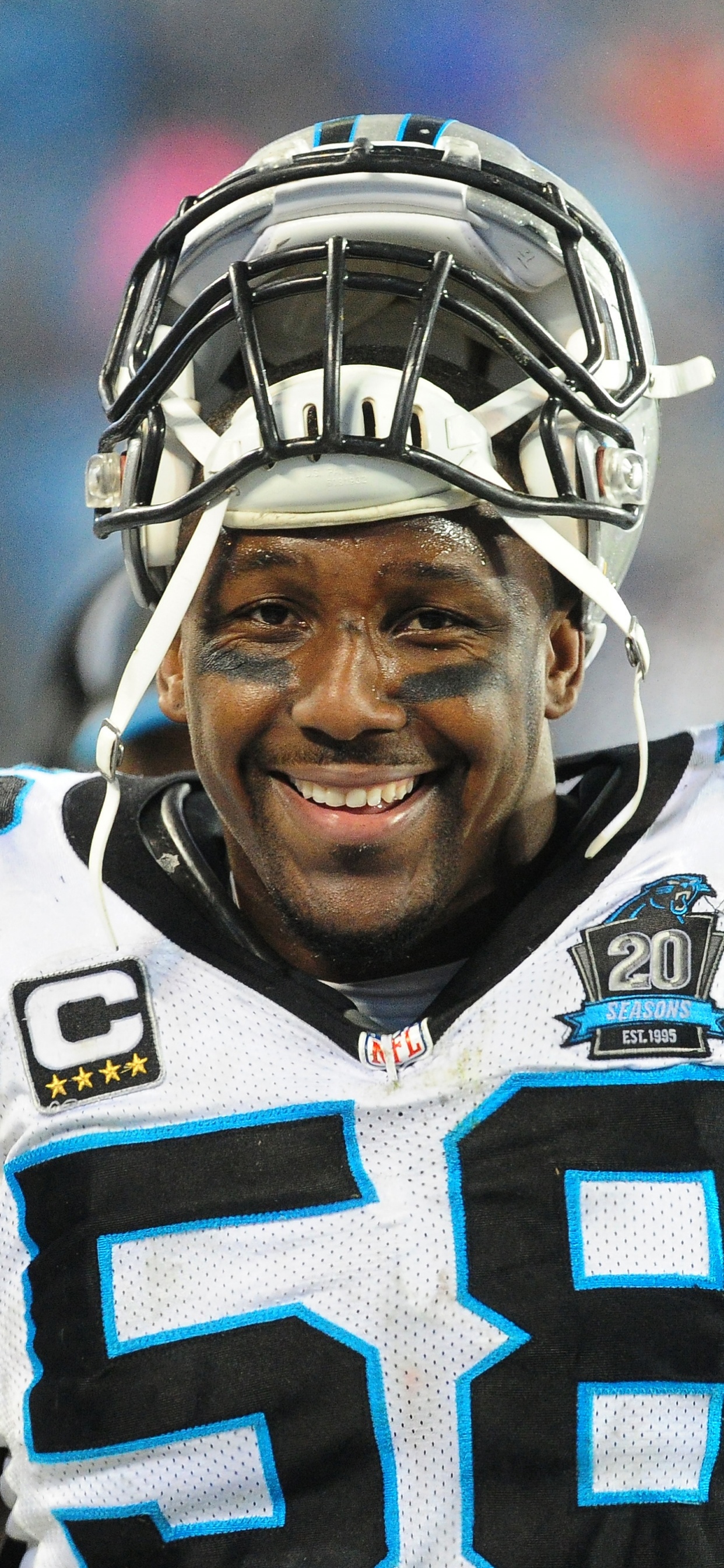 Man in Blue and White Football Jersey. Wallpaper in 1242x2688 Resolution