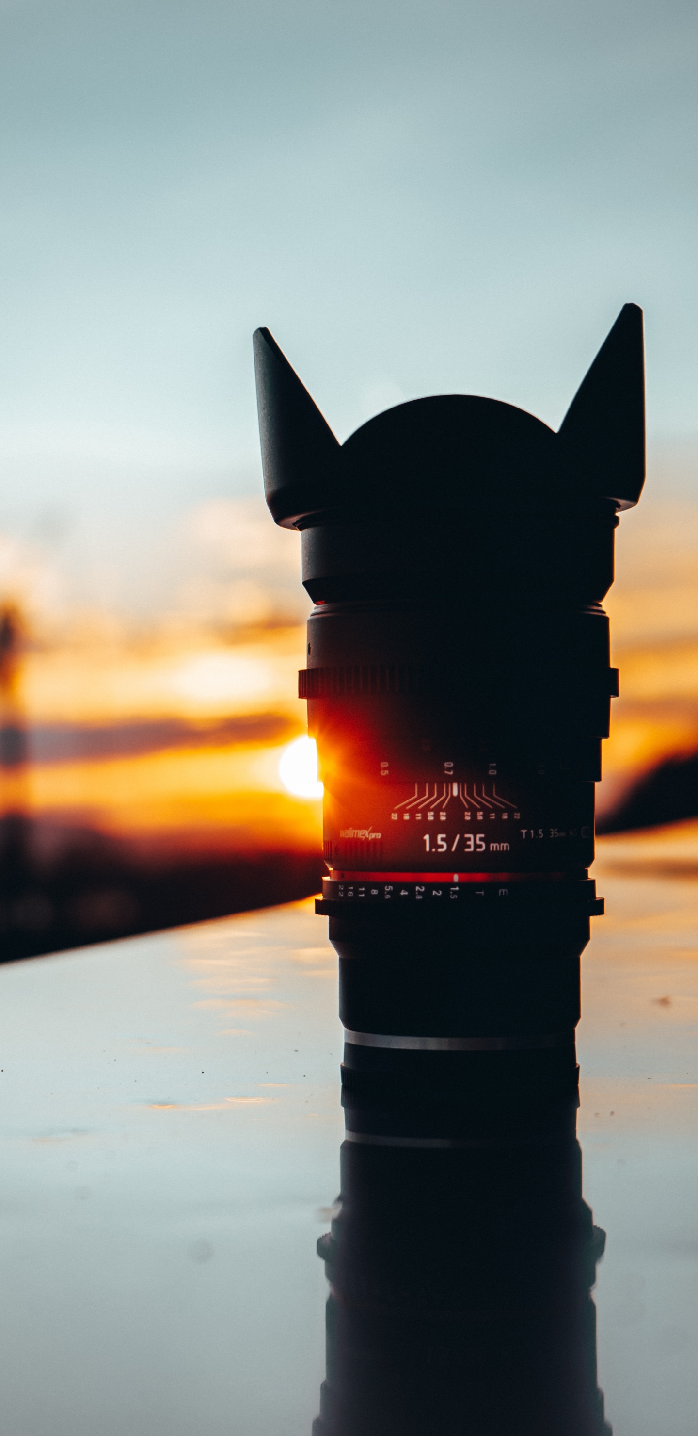 Black Dslr Camera Lens on White Table. Wallpaper in 1440x2960 Resolution
