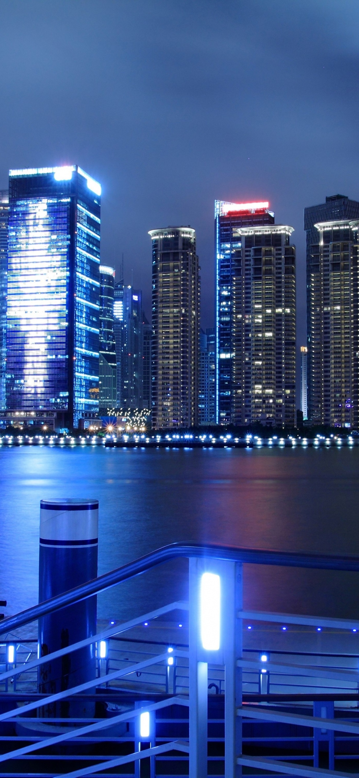 City Skyline During Night Time. Wallpaper in 1242x2688 Resolution