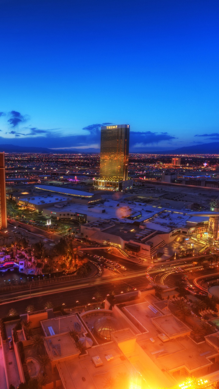 Horizonte de la Ciudad Durante la Noche. Wallpaper in 720x1280 Resolution