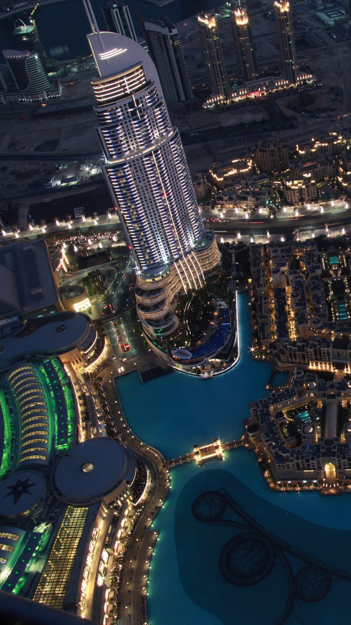 Aerial View of City Buildings During Night Time. Wallpaper in 720x1280 Resolution