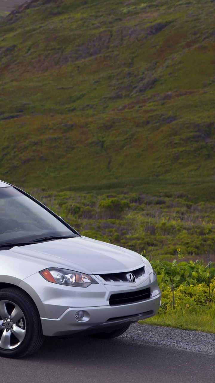 Silver Suv on Gray Asphalt Road. Wallpaper in 720x1280 Resolution