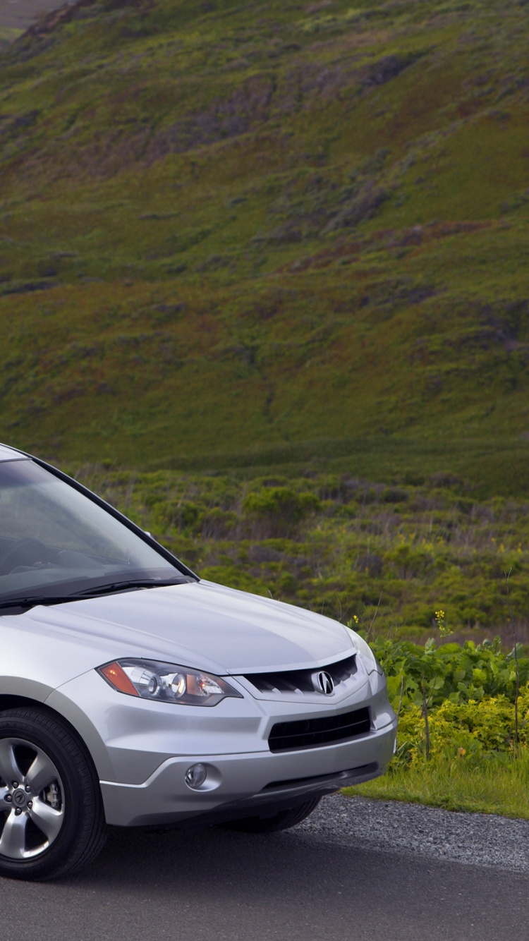 Silver Suv on Gray Asphalt Road. Wallpaper in 750x1334 Resolution