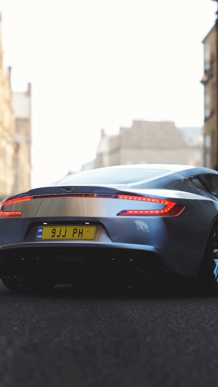 Black Porsche 911 on Road During Daytime. Wallpaper in 720x1280 Resolution