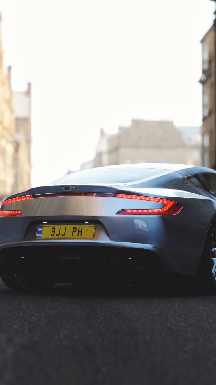 Black Porsche 911 on Road During Daytime. Wallpaper in 750x1334 Resolution