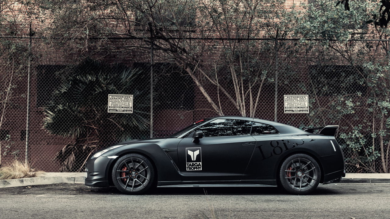 Black Porsche 911 Parked Near Brown Bare Trees During Daytime. Wallpaper in 1280x720 Resolution