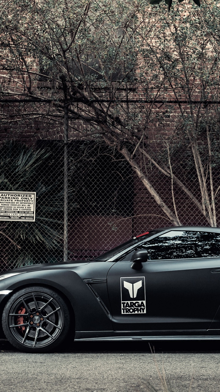 Black Porsche 911 Parked Near Brown Bare Trees During Daytime. Wallpaper in 720x1280 Resolution
