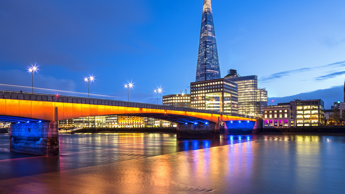 Lighted Bridge Over River During Night Time. Wallpaper in 1366x768 Resolution