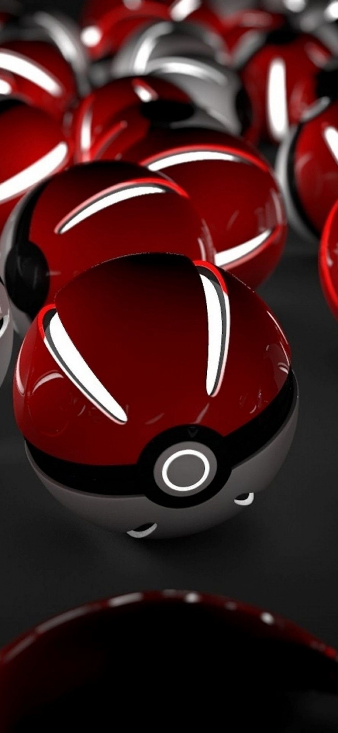 Jouet en Plastique Rond Rouge et Noir. Wallpaper in 1125x2436 Resolution