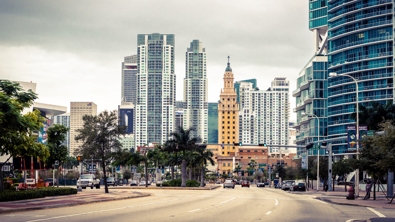 People Walking on Sidewalk Near High Rise Buildings During Daytime. Wallpaper in 1366x768 Resolution