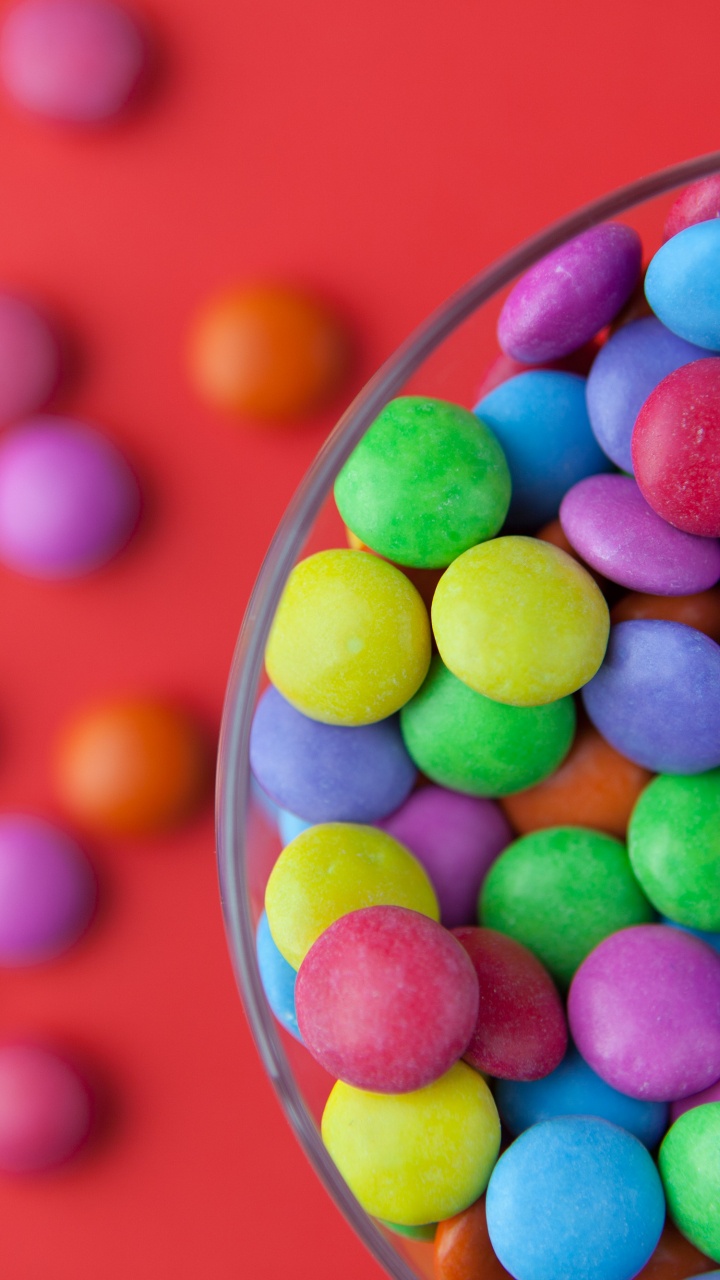 Assorted Color of Candies in Clear Glass Bowl. Wallpaper in 720x1280 Resolution