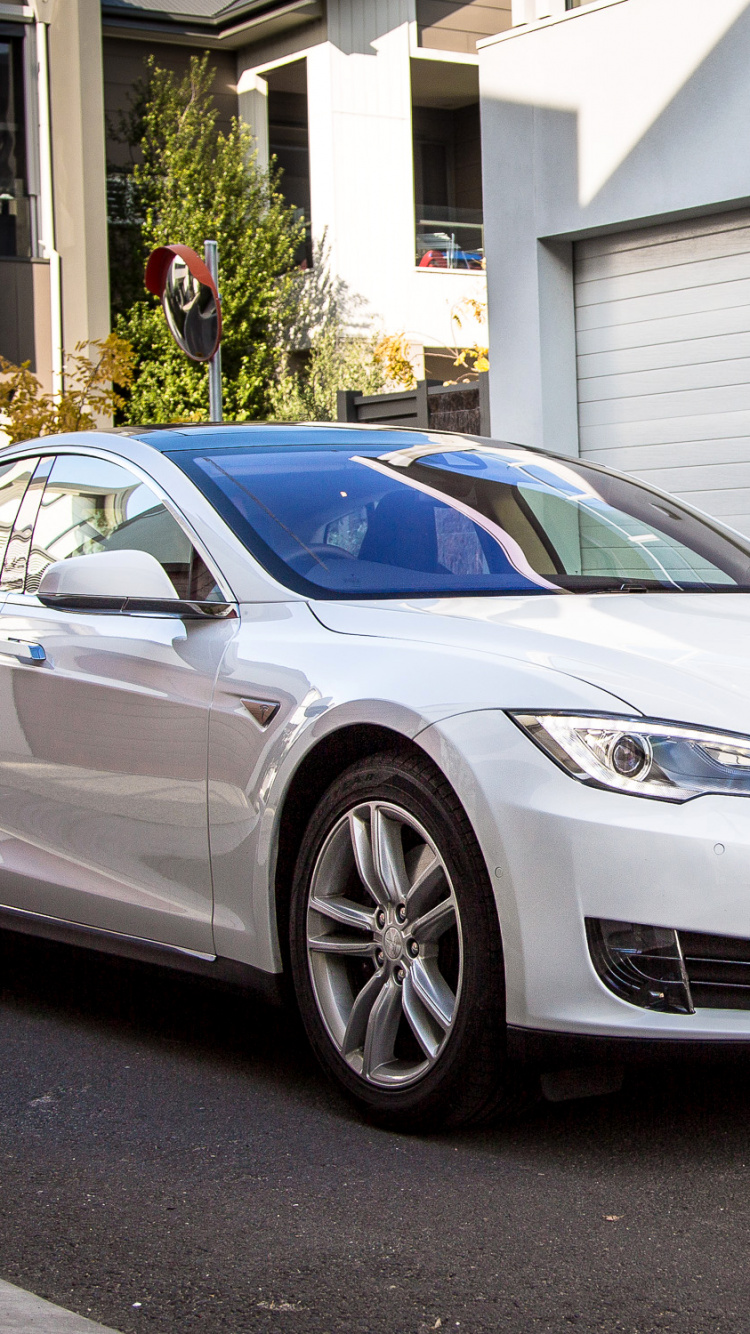 White Mercedes Benz Coupe Parked Near White Building During Daytime. Wallpaper in 750x1334 Resolution
