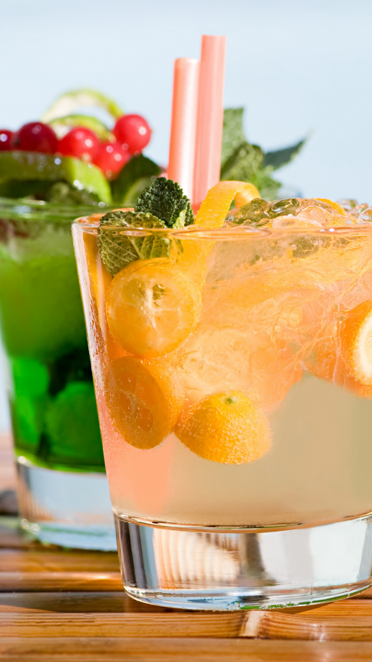 Clear Drinking Glass With Orange Juice. Wallpaper in 750x1334 Resolution