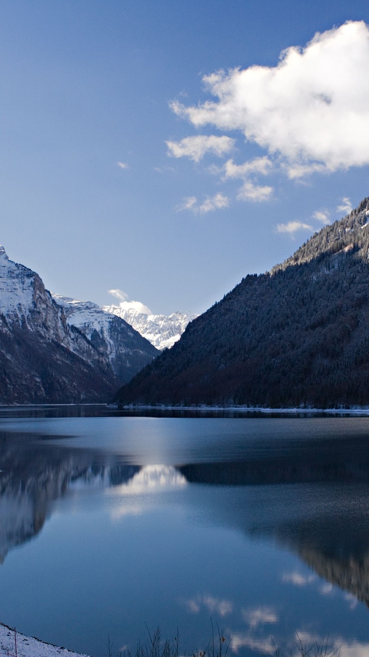 Lake Near Mountain Under Blue Sky During Daytime. Wallpaper in 720x1280 Resolution