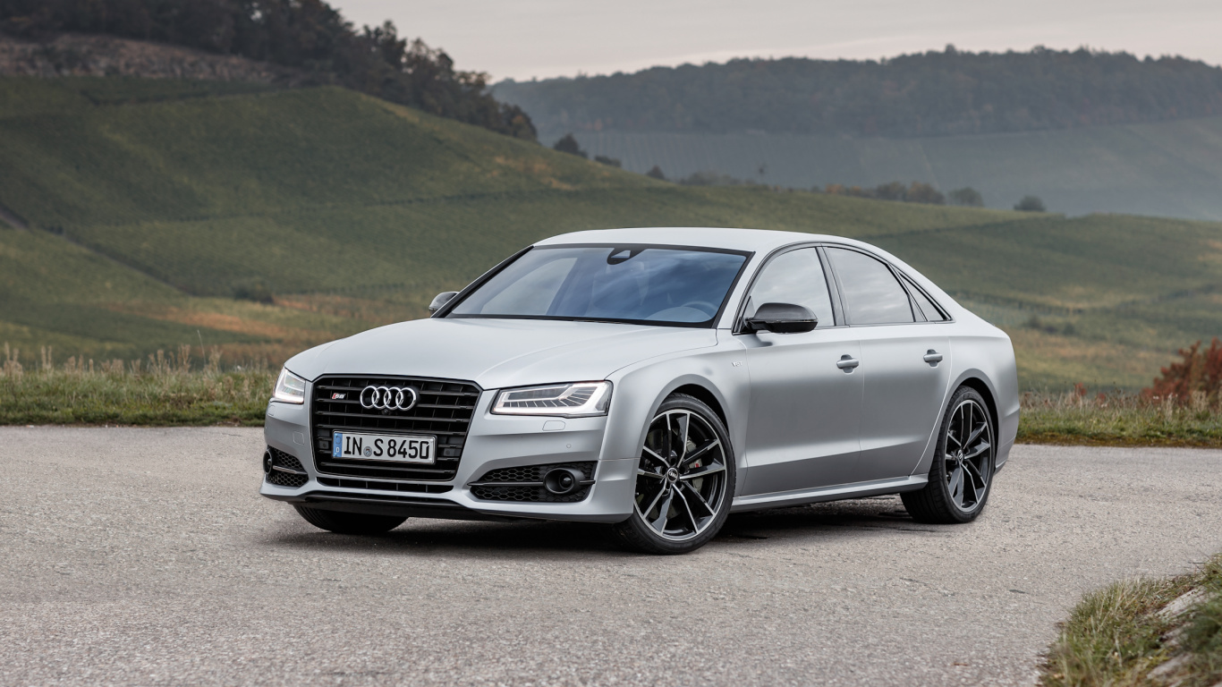 Black Audi a 4 Sedan on Brown Dirt Road During Daytime. Wallpaper in 1366x768 Resolution