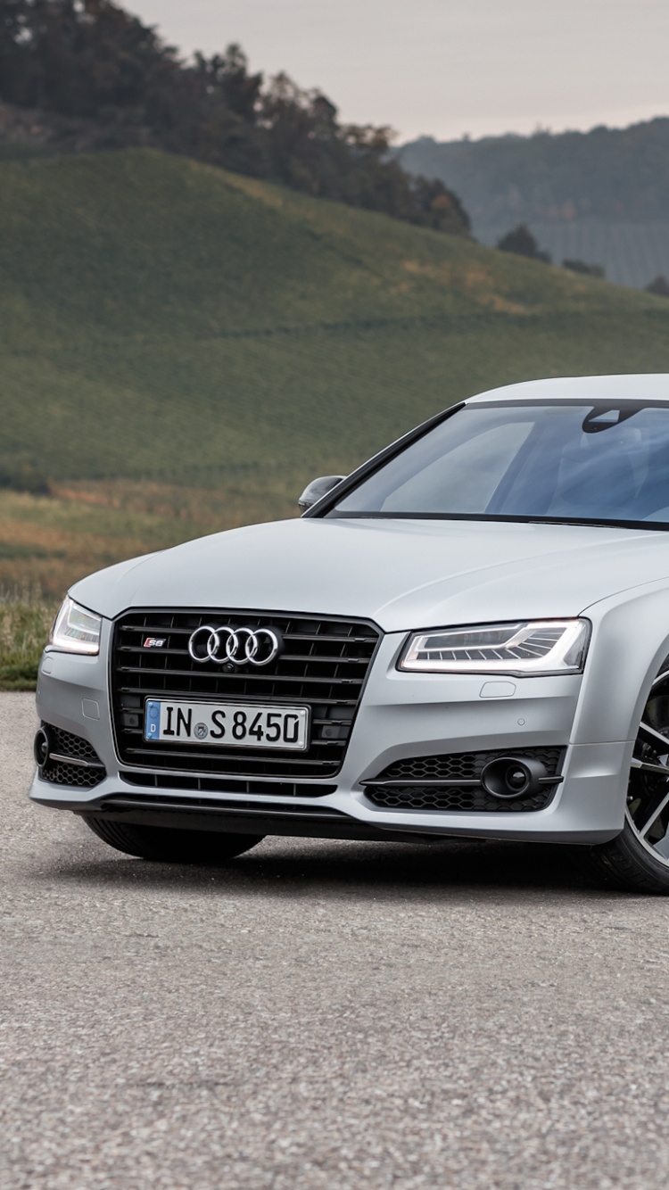 Black Audi a 4 Sedan on Brown Dirt Road During Daytime. Wallpaper in 750x1334 Resolution