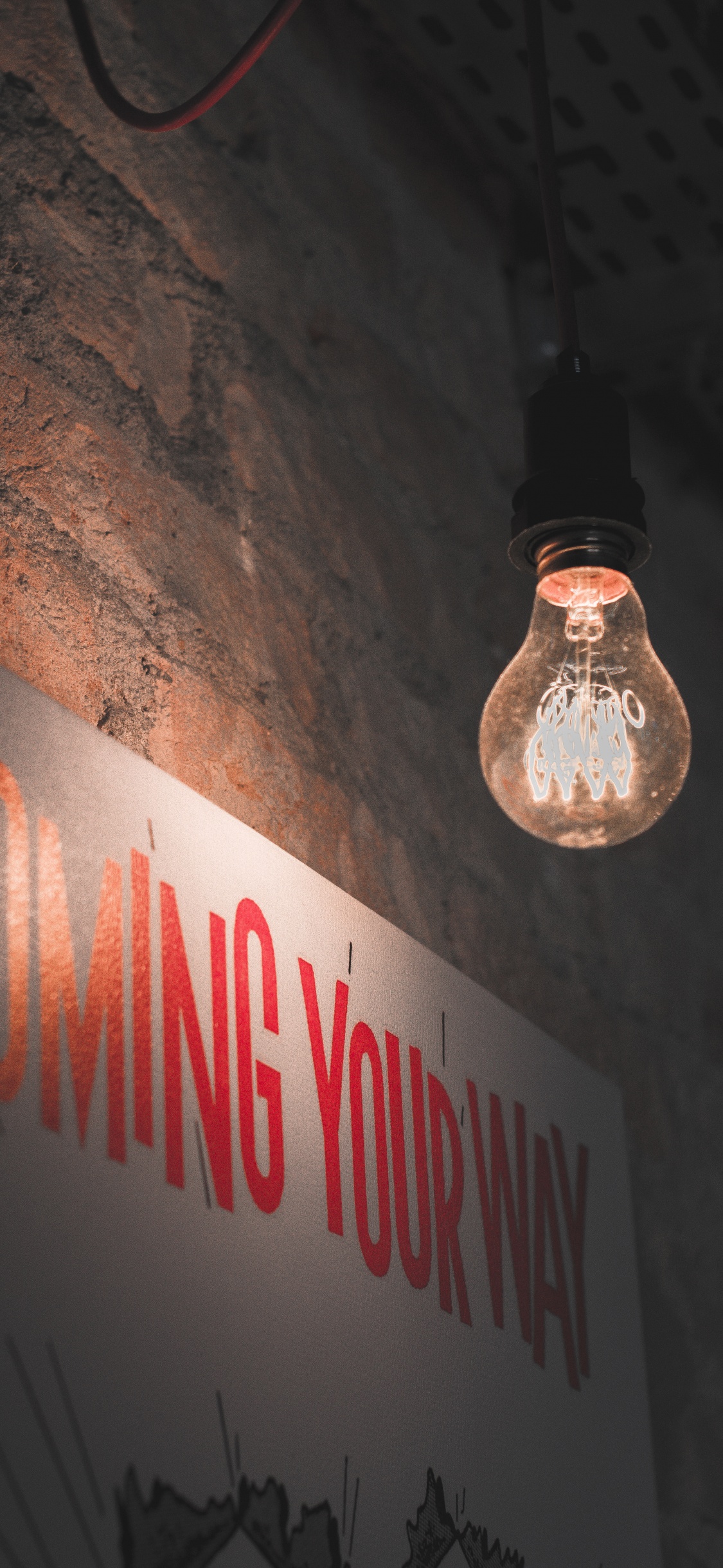 Lumière de Coca Cola Sur Mur Marron. Wallpaper in 1125x2436 Resolution