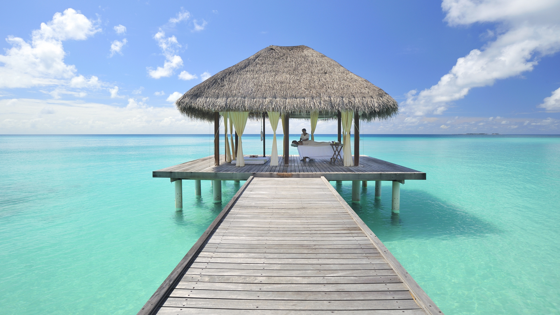 Brown Wooden Dock on Blue Sea Under Blue Sky During Daytime. Wallpaper in 1920x1080 Resolution