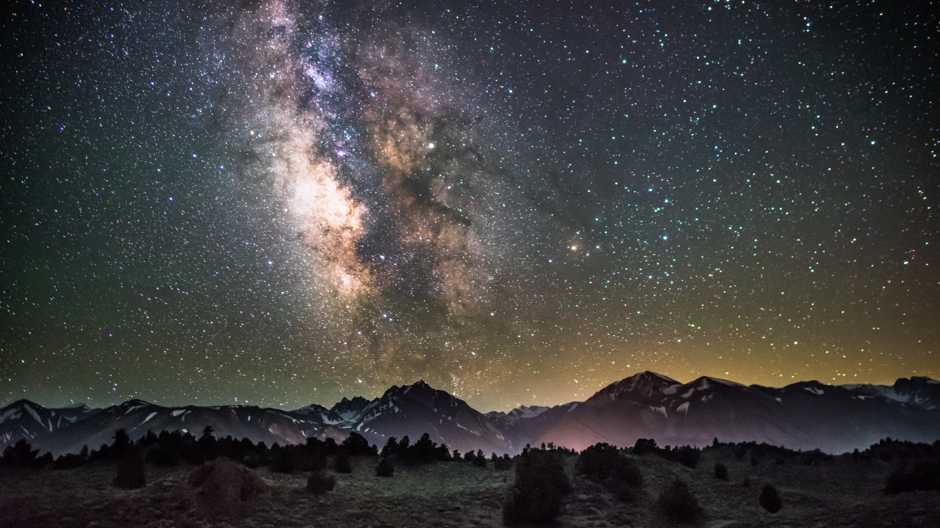 Black and White Mountain Under Blue Sky With Stars During Night Time. Wallpaper in 1366x768 Resolution