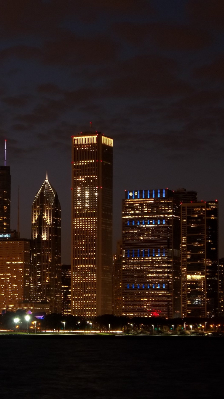 City Skyline During Night Time. Wallpaper in 750x1334 Resolution