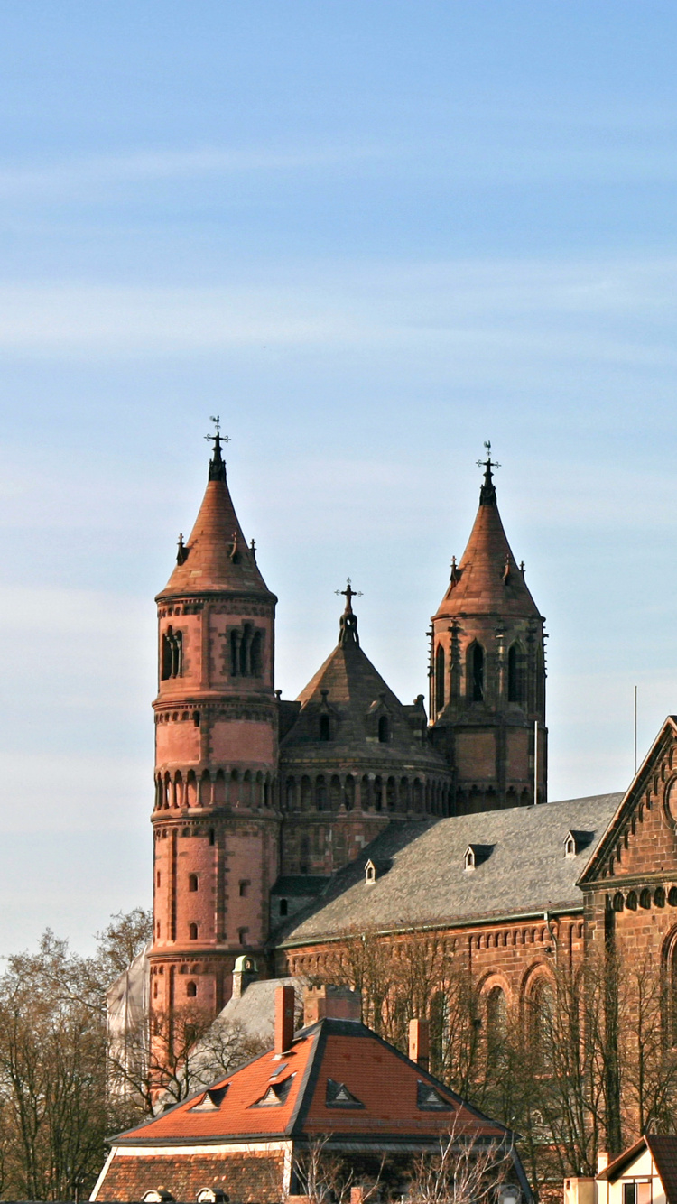 Braunes Und Graues Betongebäude. Wallpaper in 750x1334 Resolution