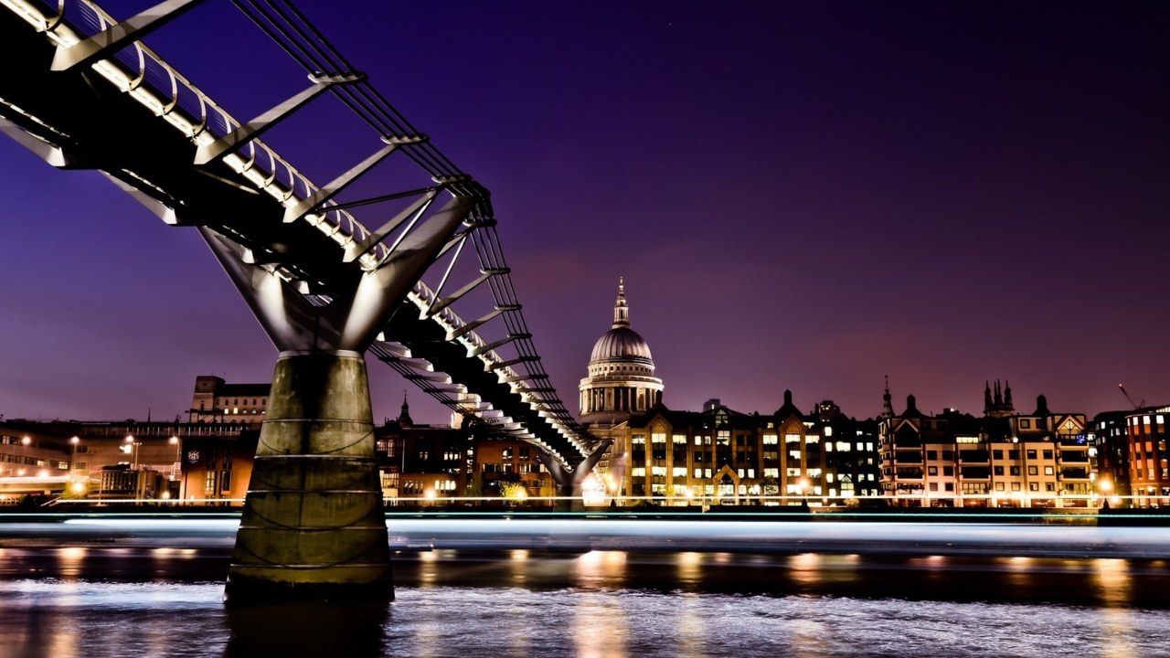 Lighted Bridge Over River During Night Time. Wallpaper in 1280x720 Resolution