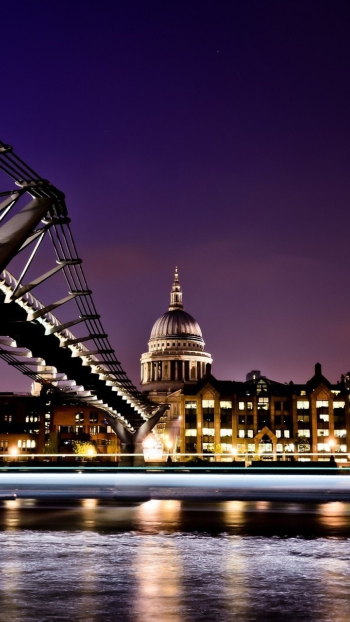Lighted Bridge Over River During Night Time. Wallpaper in 720x1280 Resolution