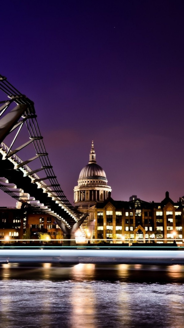 Lighted Bridge Over River During Night Time. Wallpaper in 750x1334 Resolution