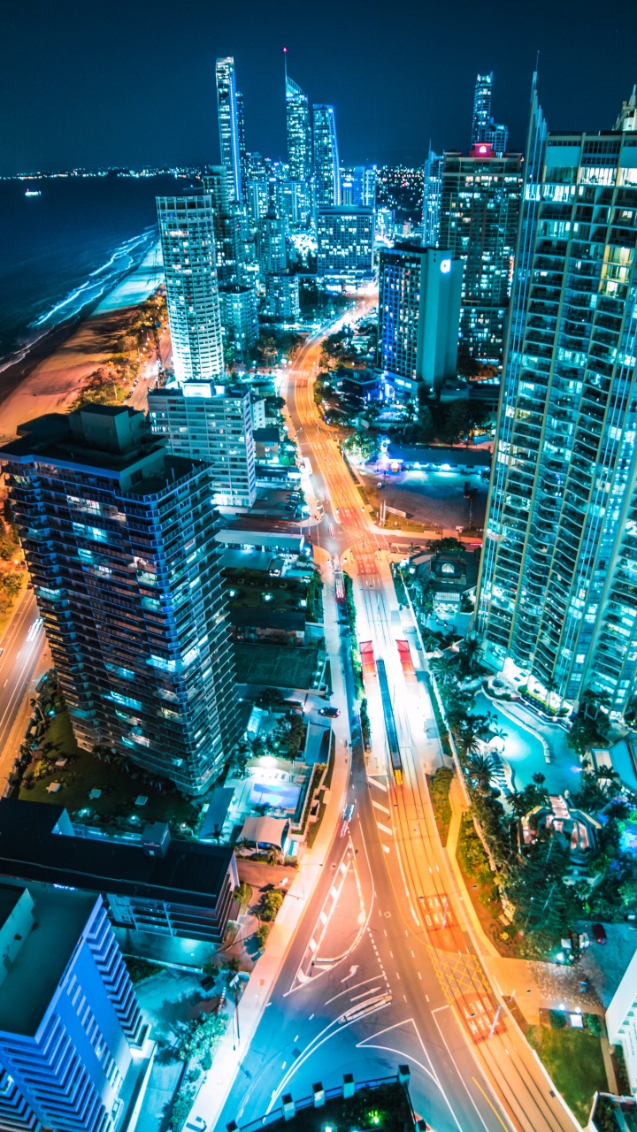 City Skyline During Night Time. Wallpaper in 720x1280 Resolution