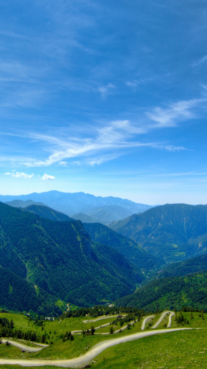 Green Mountains Under Blue Sky During Daytime. Wallpaper in 720x1280 Resolution