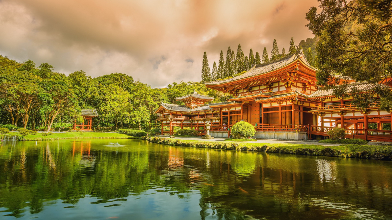 Brown and White Temple Near Green Trees and Lake Under Cloudy Sky During Daytime. Wallpaper in 1280x720 Resolution