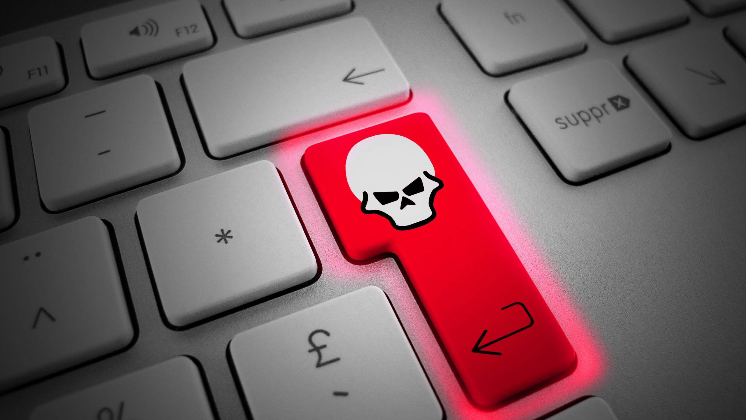 Apple-Tastatur Mit Apple-Logo. Wallpaper in 2560x1440 Resolution