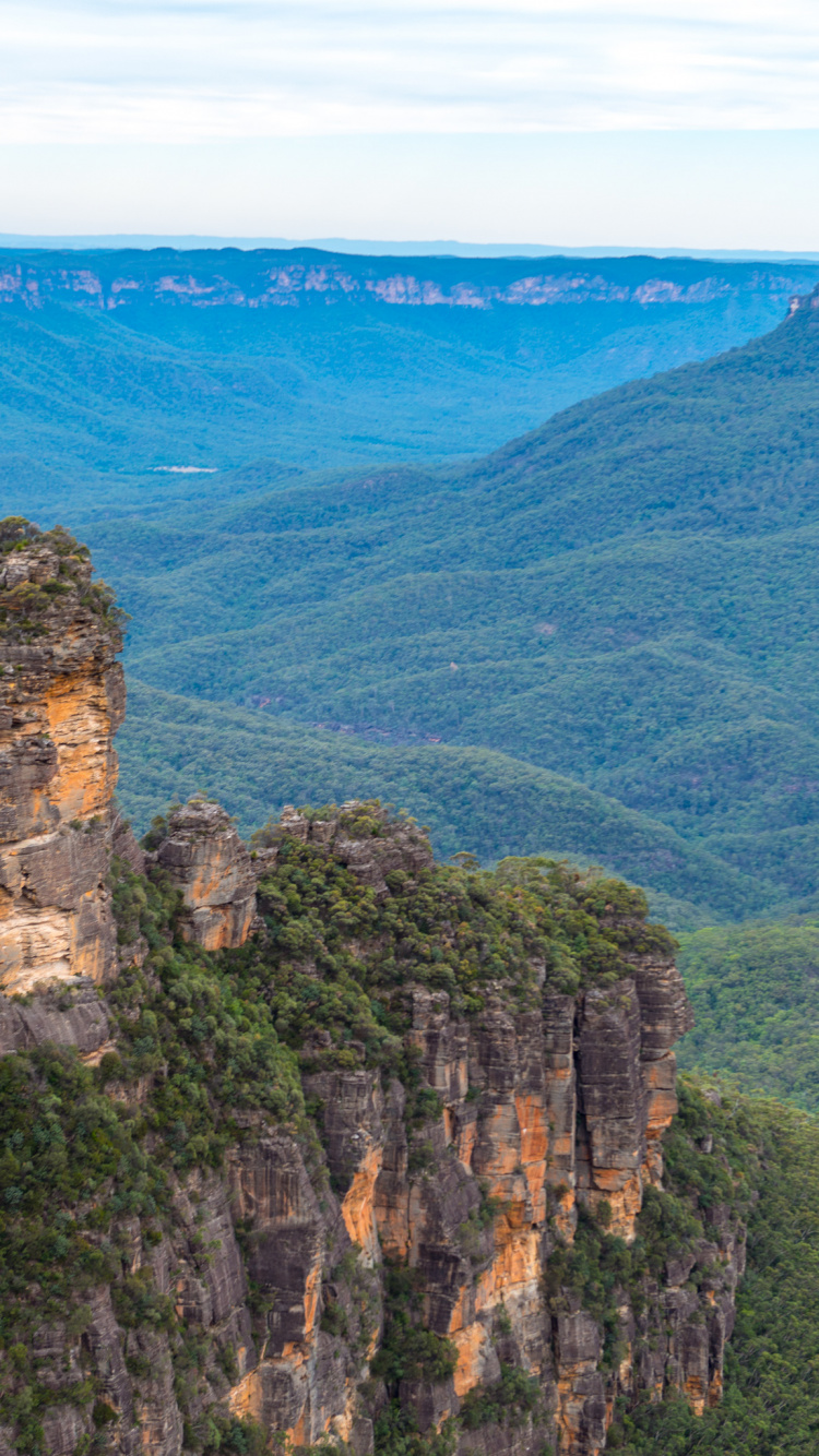Green and Brown Mountain Under Blue Sky During Daytime. Wallpaper in 750x1334 Resolution