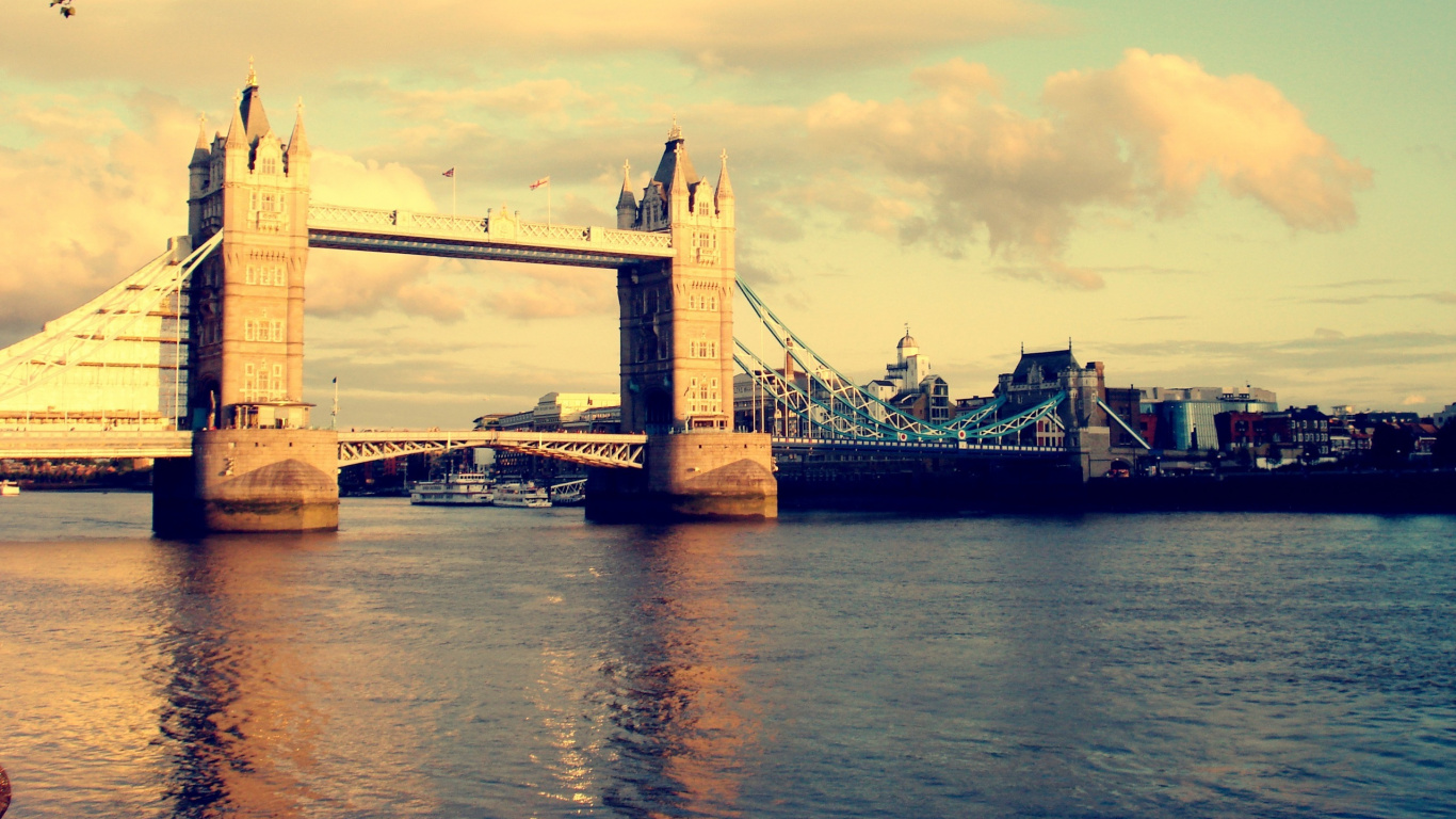 Bridge Over River During Sunset. Wallpaper in 1366x768 Resolution