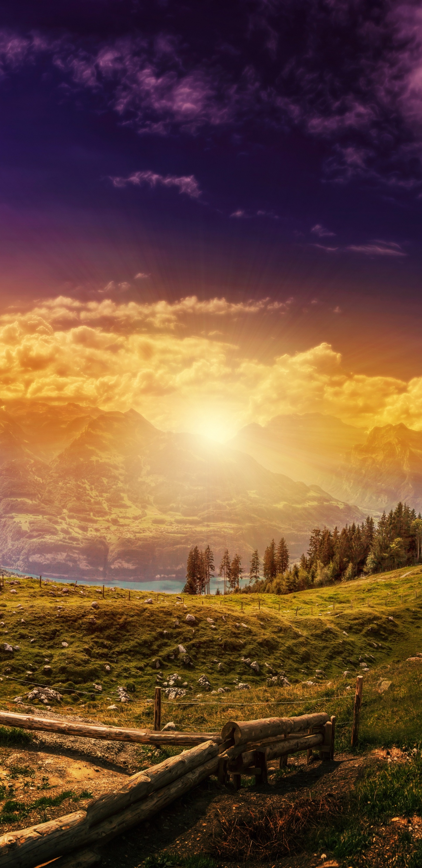 Brown Wooden Bench on Green Grass Field Near Mountains During Sunset. Wallpaper in 1440x2960 Resolution