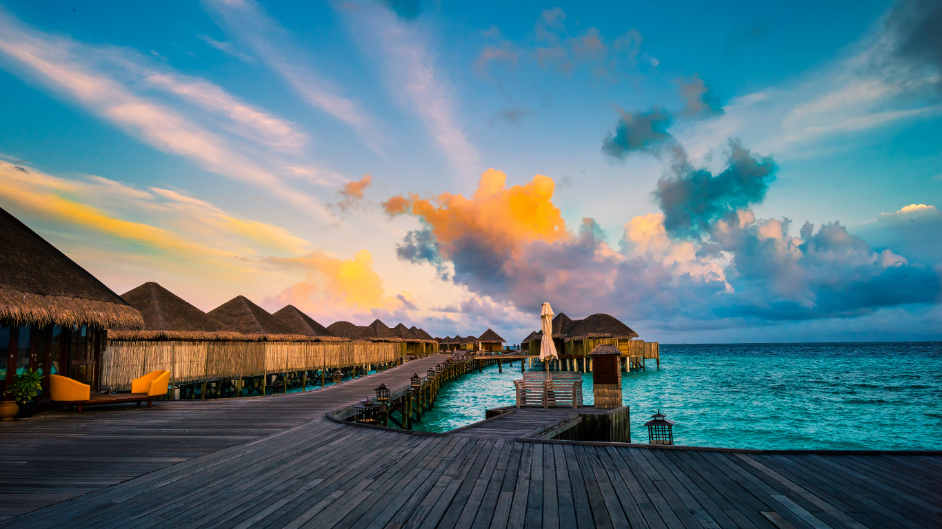 Brown Wooden Dock on Sea Under Blue Sky During Daytime. Wallpaper in 1366x768 Resolution