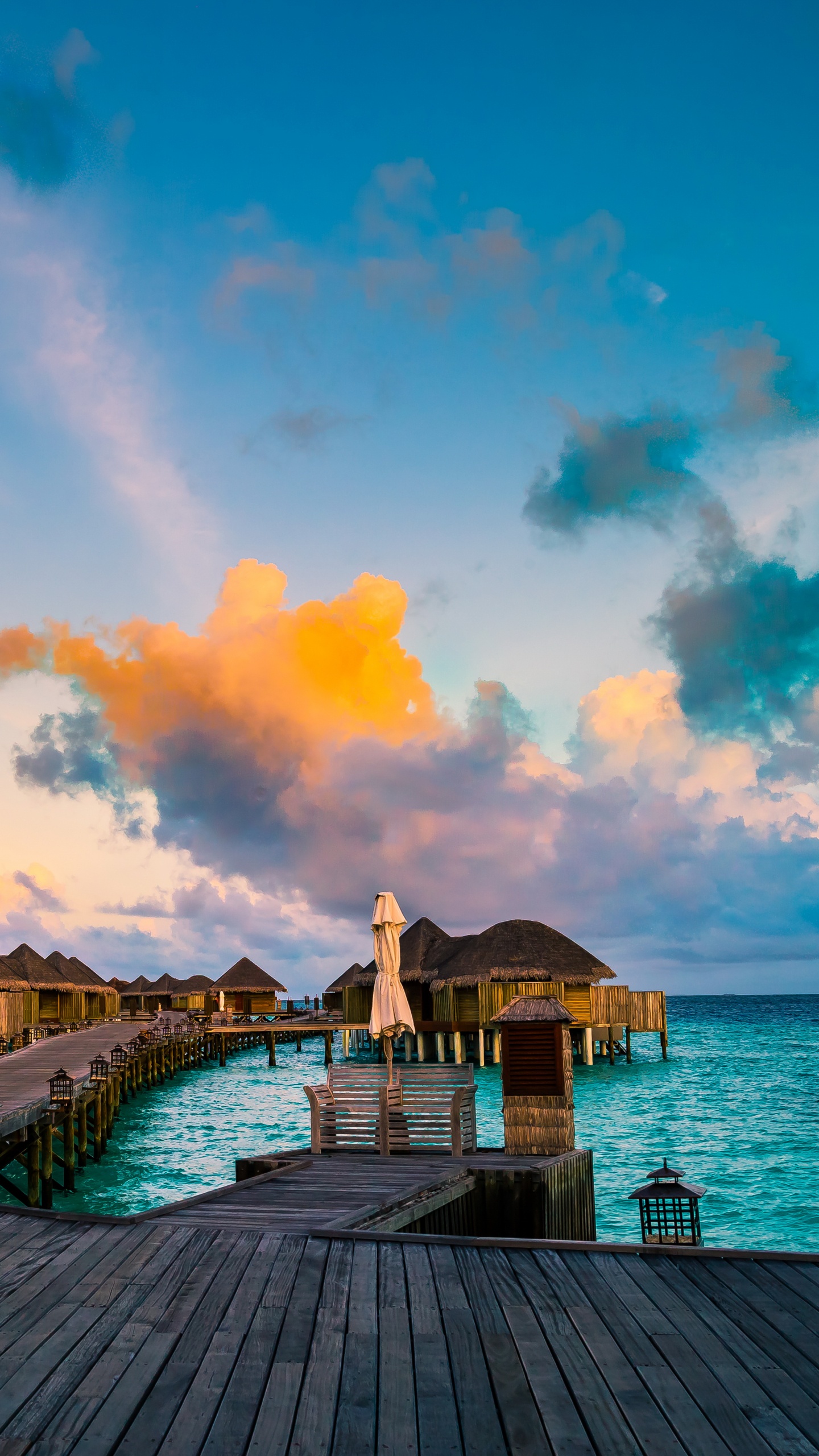 Brown Wooden Dock on Sea Under Blue Sky During Daytime. Wallpaper in 1440x2560 Resolution