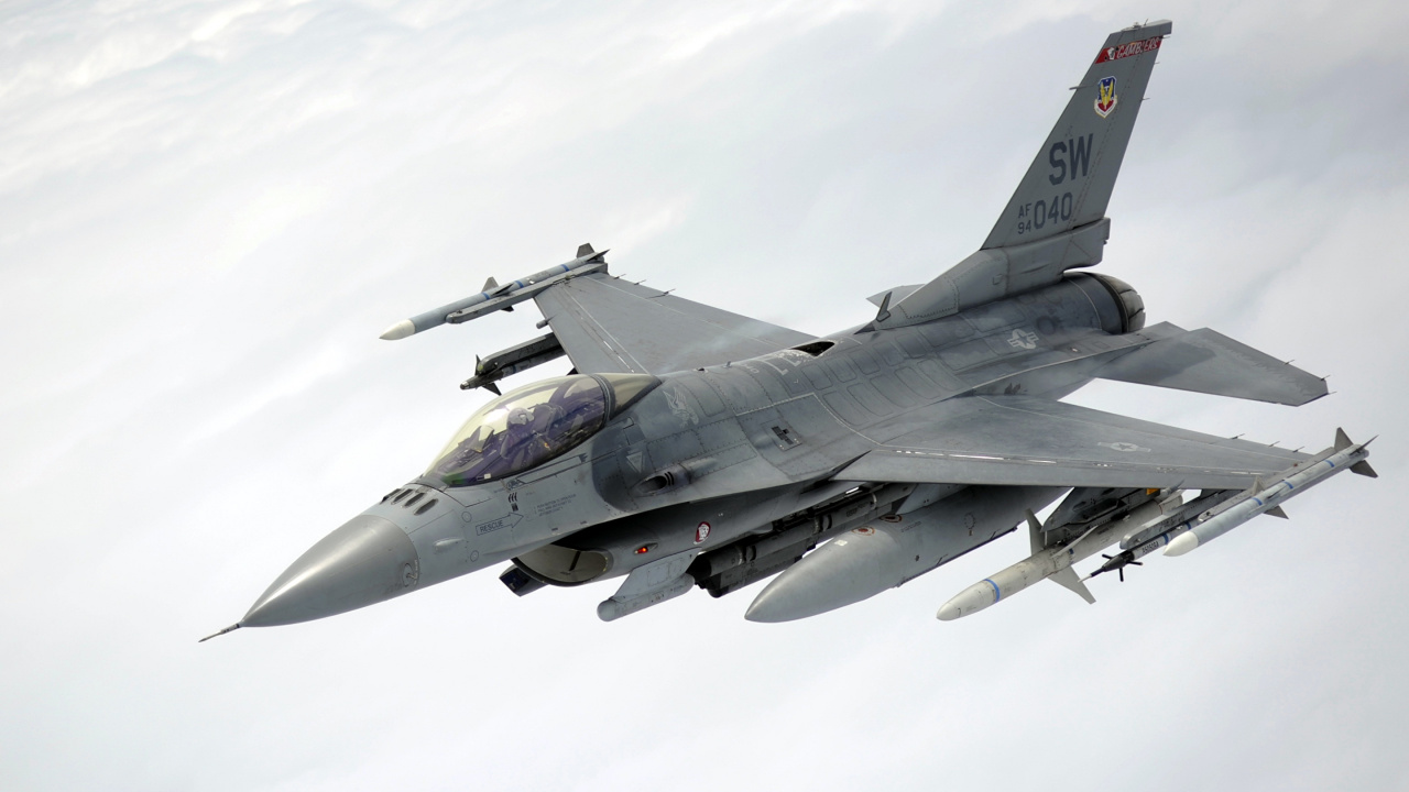 Gray Fighter Jet in Mid Air. Wallpaper in 1280x720 Resolution