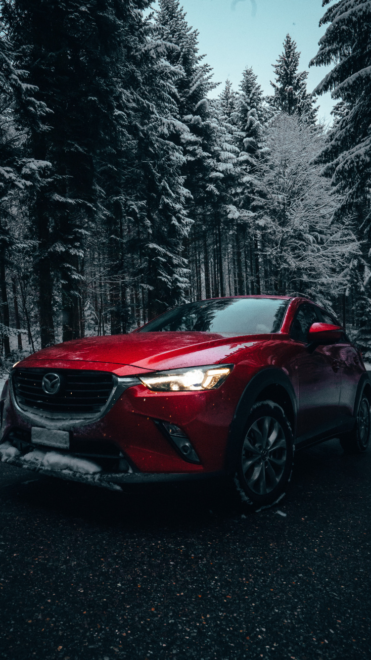 Roter Bmw m 3 Coupe Auf Schneebedecktem Boden Geparkt. Wallpaper in 750x1334 Resolution