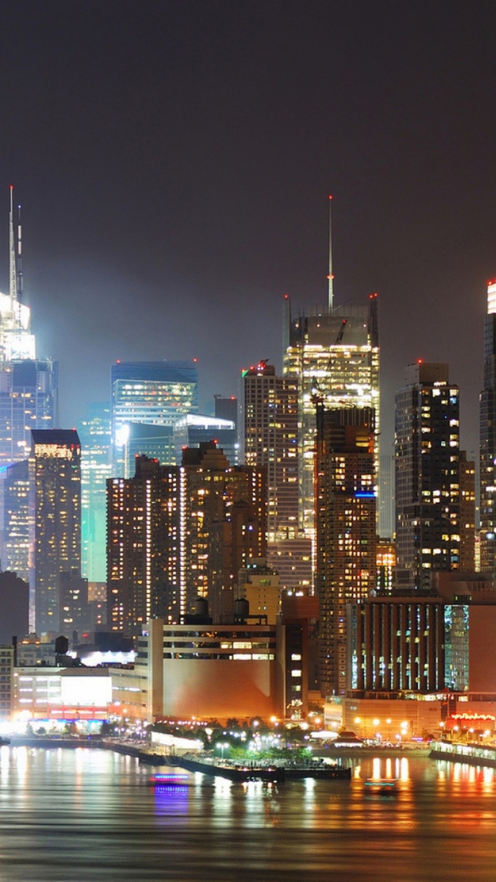 City Skyline During Night Time. Wallpaper in 720x1280 Resolution
