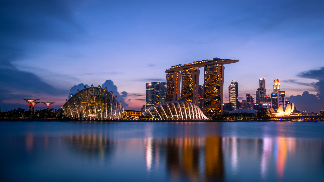 City Skyline Across Body of Water During Daytime. Wallpaper in 1366x768 Resolution