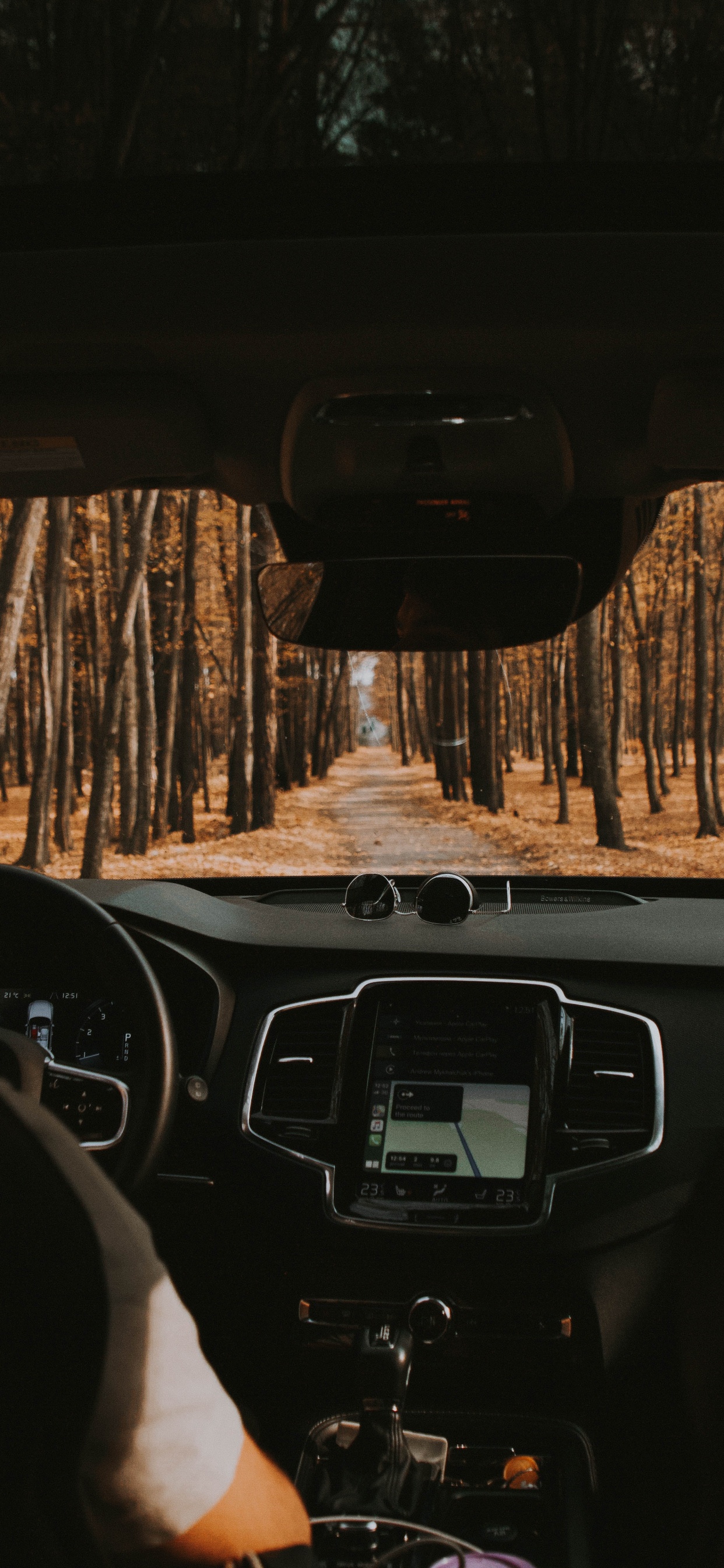 Black Car Steering Wheel During Daytime. Wallpaper in 1242x2688 Resolution