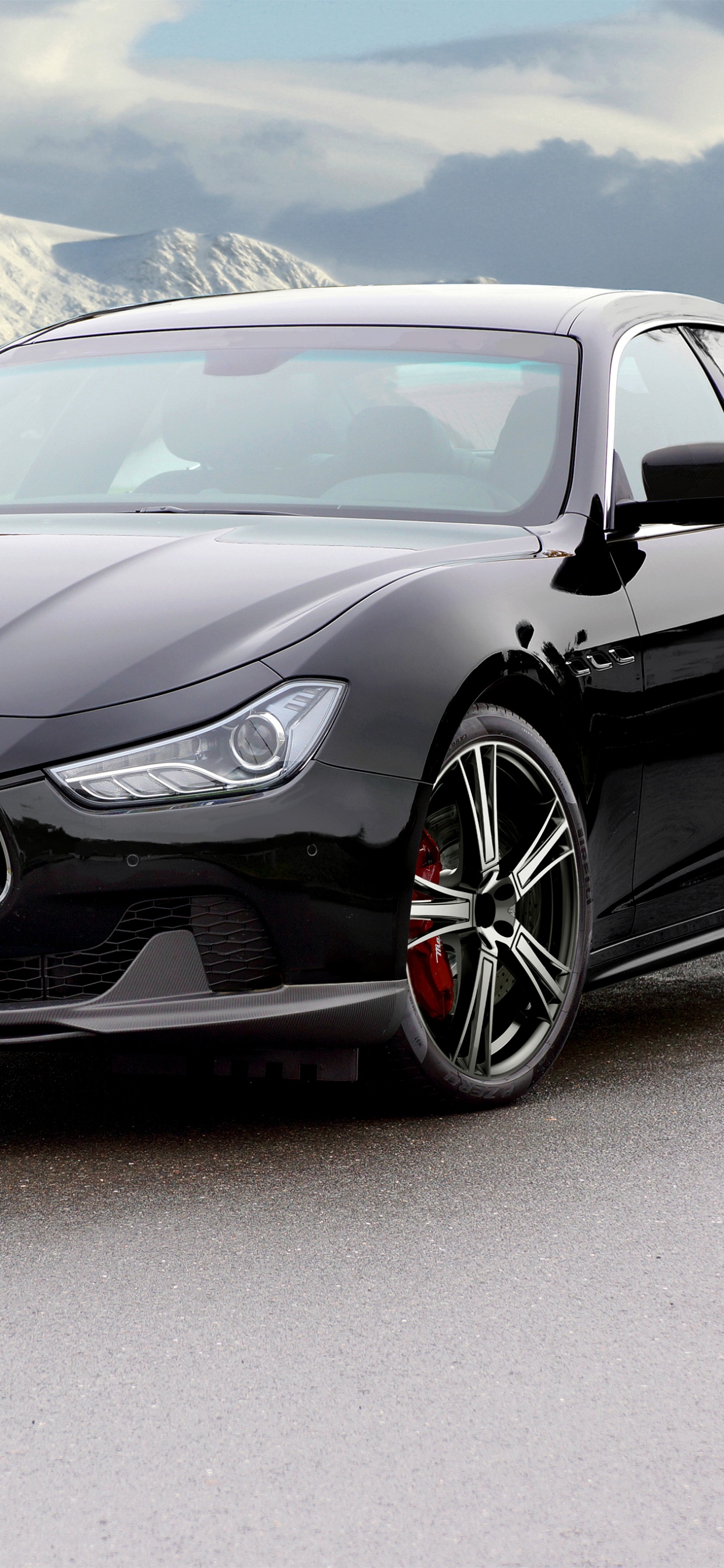 Black Mercedes Benz Coupe on Gray Sand During Daytime. Wallpaper in 1242x2688 Resolution