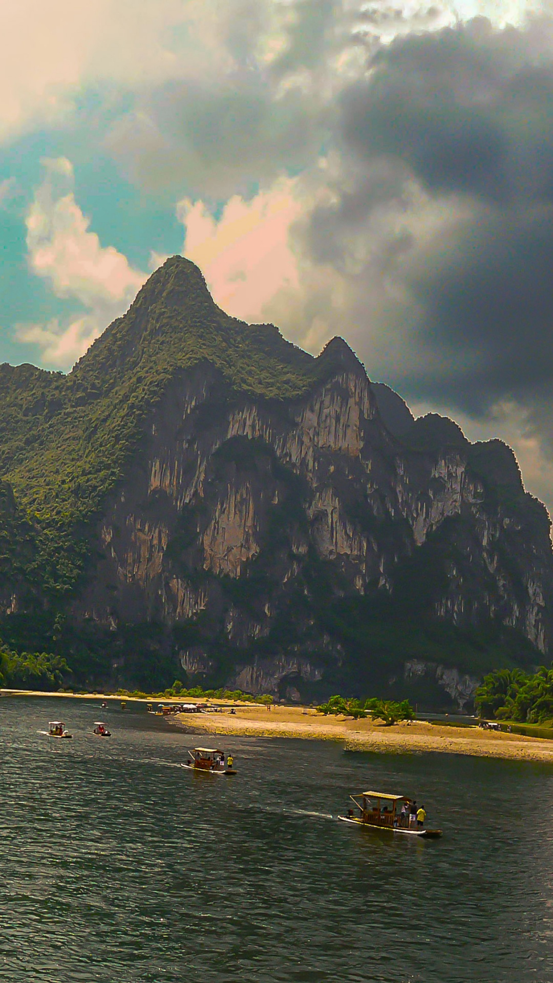 People Riding Boat on Sea Near Mountain During Daytime. Wallpaper in 1080x1920 Resolution