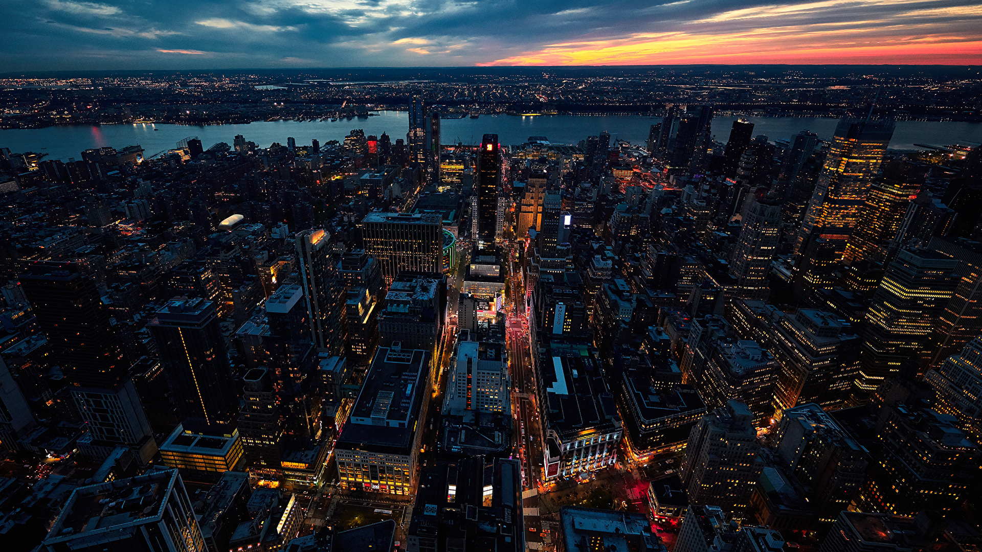 Aerial View of City Buildings During Night Time. Wallpaper in 1920x1080 Resolution