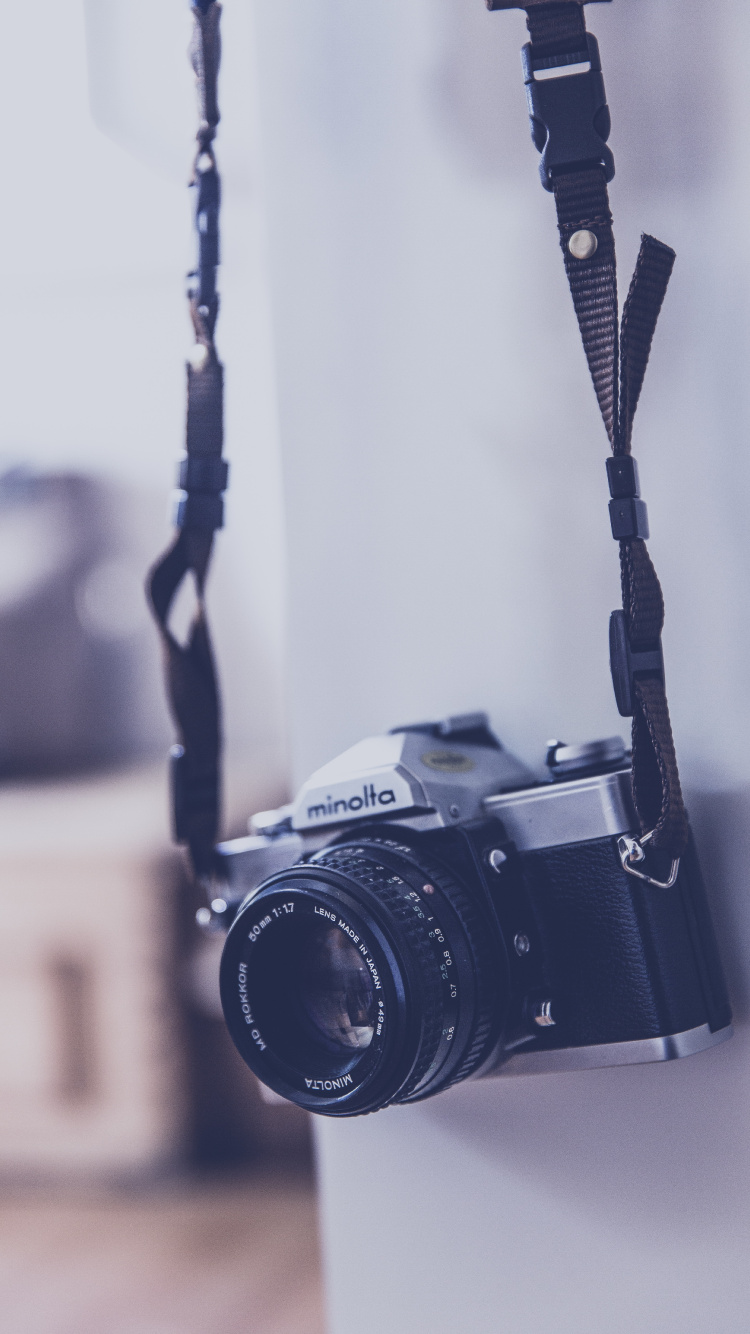 Black and Silver Nikon Dslr Camera. Wallpaper in 750x1334 Resolution