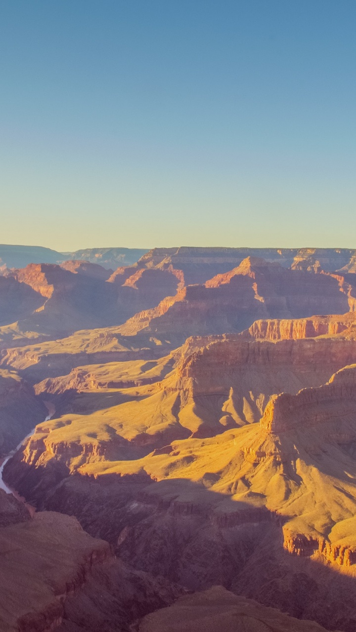 Brown and Black Mountains Under Blue Sky During Daytime. Wallpaper in 720x1280 Resolution