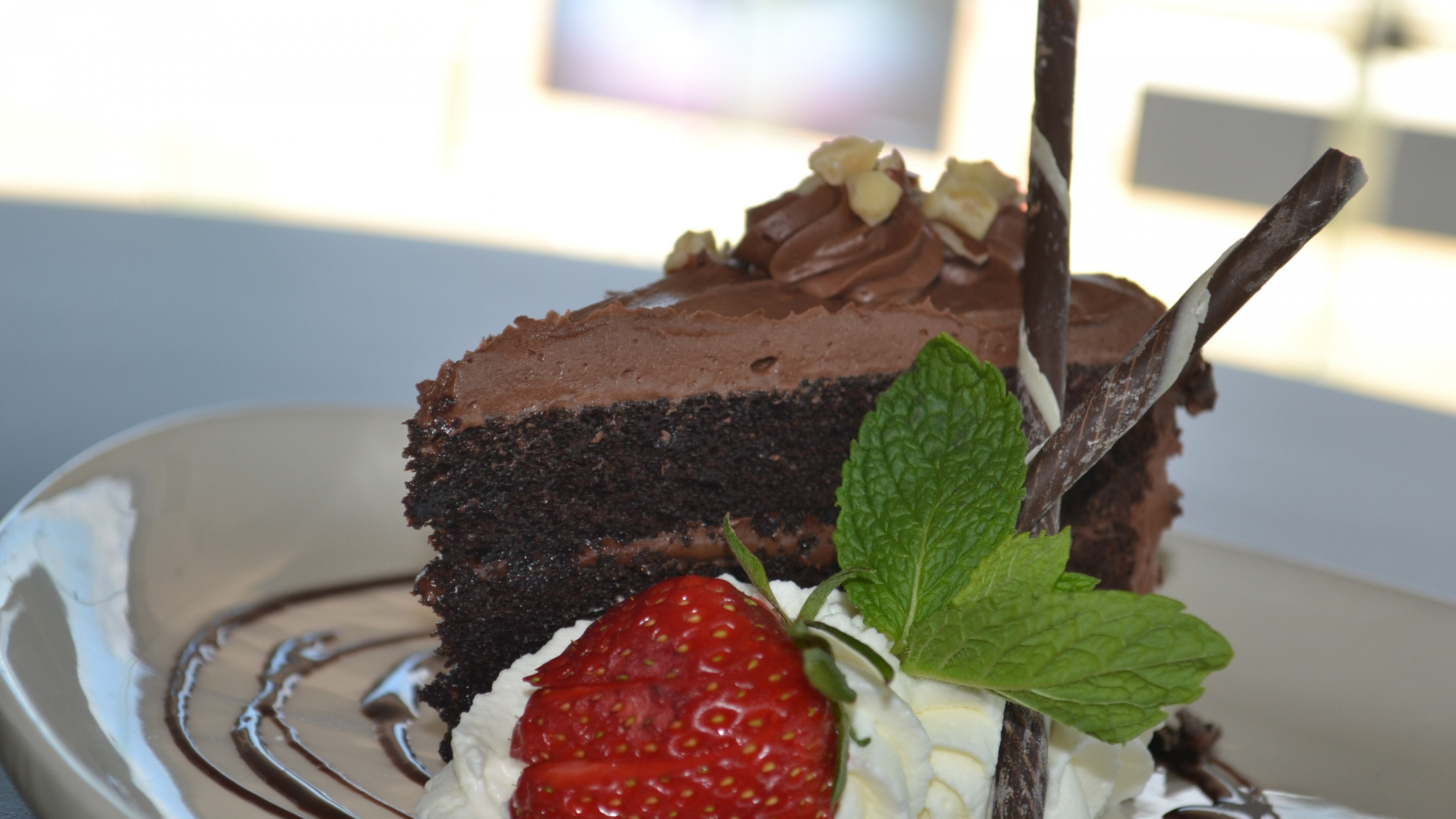 Chocolate Cake With Strawberry on White Ceramic Plate. Wallpaper in 3840x2160 Resolution