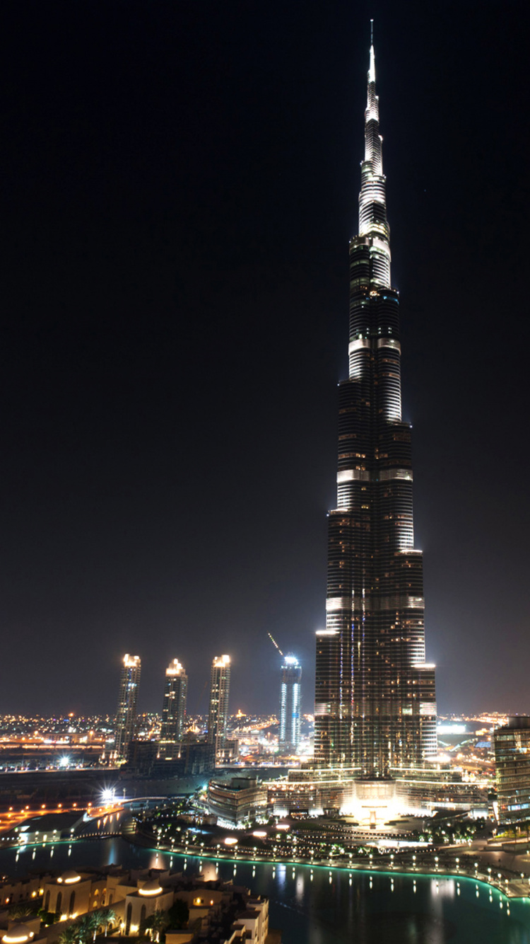 Horizon de la Ville Pendant la Nuit. Wallpaper in 750x1334 Resolution